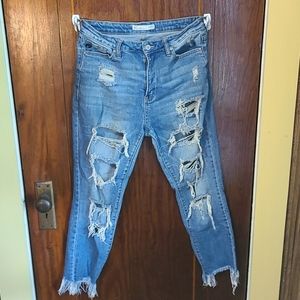A size 28 distressed highrise KanCan jeans